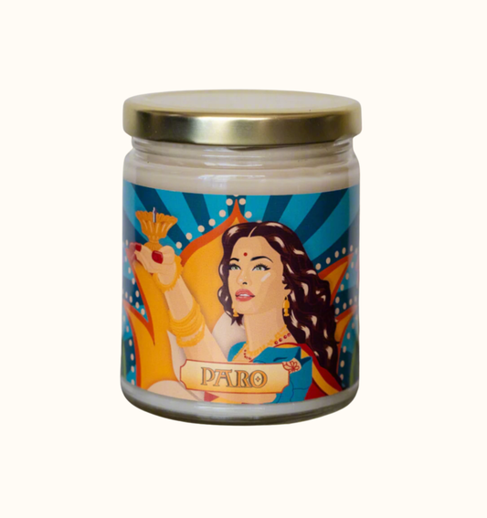Candle jar with a colourful label featuring artwork of Aishwarya Rai from the Bollywood movie Devdas and the text "Paro".