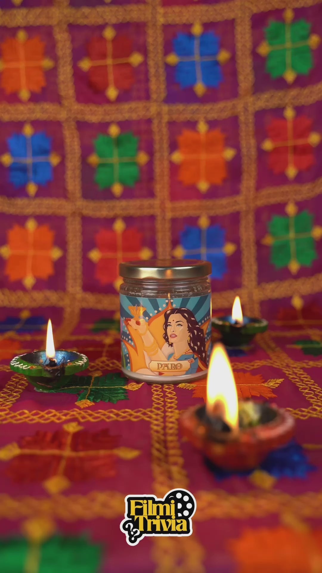 Filmi Trivia, a Bollywood themed Trivia card game, and the Paro Candle, a chai scented candle with artwork featuring Paro played by Aishwarya Rai in the Bollywood movie Devdas. Text says "This Diwali give the gift of light and fun".